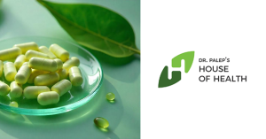 Overhead shot of Ayurvedic Supplements pills in a green and white color scheme, arranged on a glass platter atop a reflective glass table, surrounded by fresh Ashwagandha leaves, captured in soft morning light.